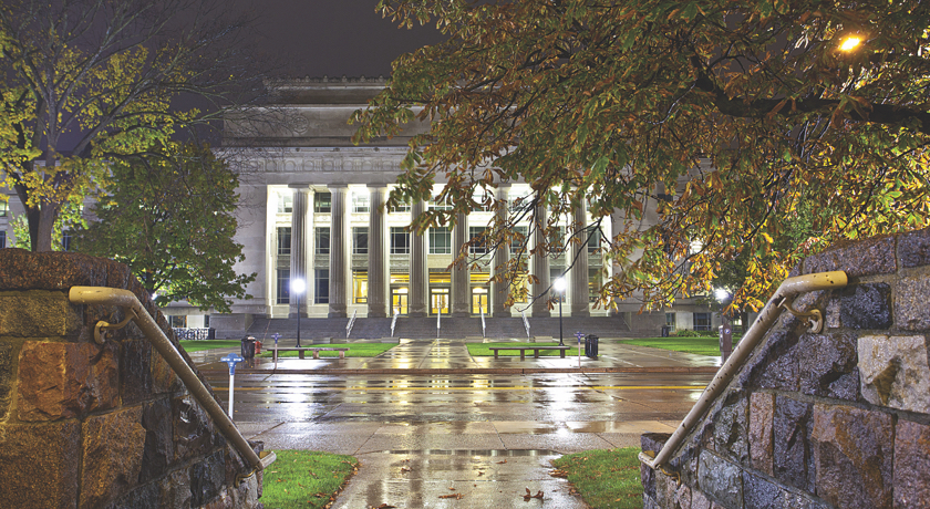 The main entrance of Angell Hall on a rainy evening.